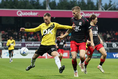 2025-11-29-16-33-25-rotterdam-l-r-boyd-lucassen-of-nac-breda-rick-meissen-of-excelsior-tijdens-de-ne.webp