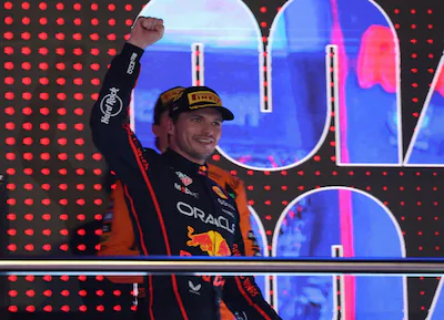 epa12560445-first-placed-red-bull-racing-driver-max-verstappen-of-netherlands-celebrates-on-the-podi.webp