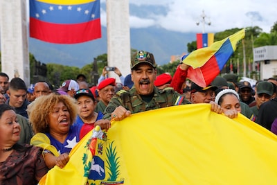 venezuelan-president-nicolas-maduro-takes-part-in-a-government-organized-civic-military-rally-in-car.jpeg