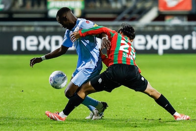 1764570958_2025-11-29-21-05-19-nijmegen-joshua-kitolano-of-sparta-rotterdam-kodai-sano-of-nec-nijmegen-l-r-tijd.jpeg