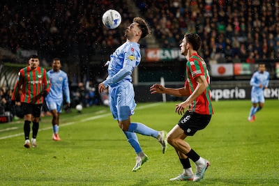2025-11-29-21-21-04-nijmegen-mitchell-van-bergen-of-sparta-rotterdam-ahmetcan-kaplan-of-nec-nijmegen.jpeg