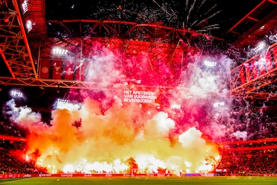 amsterdam-netherlands-november-30-supporters-set-off-fireworks-in-memory-of-a-deceased-fan-during-th.jpeg