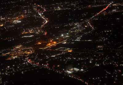 an-aerial-view-shows-cairo-s-traffic-with-buildings-and-houses-through-the-window-of-an-egyptair-air.avif