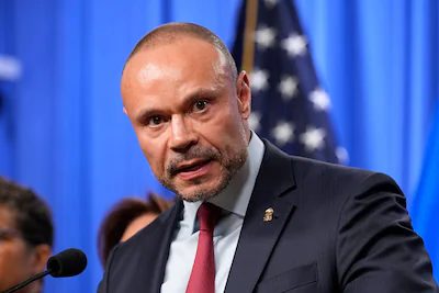 dan-bongino-fbi-deputy-director-speaks-during-a-news-conference-at-the-department-of-justice-thursda.webp