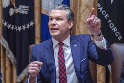 epa12565238-us-secretary-of-war-pete-hegseth-answers-a-reporters-question-during-a-cabinet-meeting-i.avif
