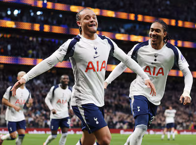 epa12574668-tottenhams-xavi-simons-poses-after-scoring-the-2-0-goal-during-the-english-premier-leagu.avif