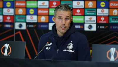 epa12583498-feyenoord-s-head-coach-robin-van-persie-attends-a-press-conference-in-bucharest-romania.webp