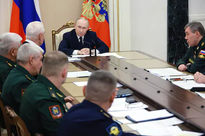epa12616888-russian-president-vladimir-putin-c-chairs-a-meeting-to-discuss-russia-s-special-military.webp