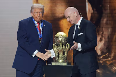 fifa-president-gianni-infantino-presents-president-donald-trump-with-the-fifa-peace-prize-during-the.avif