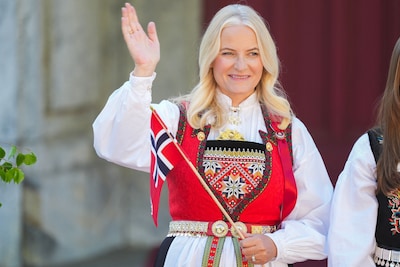 files-crown-princess-mette-marit-of-norway-greets-the-children-s-parade-during-the-may-17-celebratio.jpeg