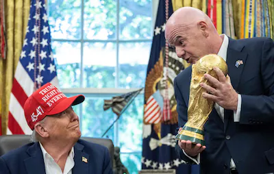 files-fifa-president-gianni-infantino-r-hands-the-world-cup-trophy-to-us-president-donald-trump-in-t.webp