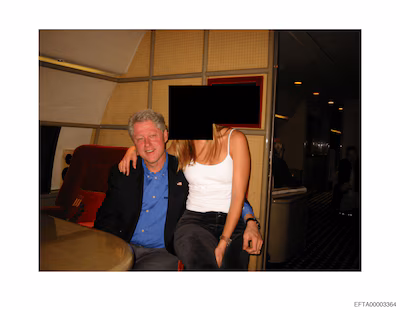 former-u-s-president-bill-clinton-and-a-woman-are-seen-in-this-image-from-the-estate-of-late-financi.avif