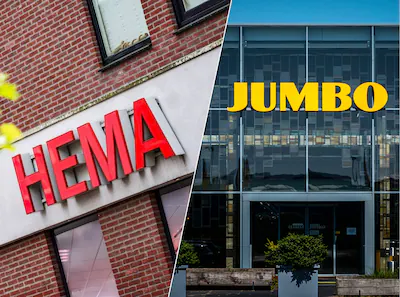 foto-ter-illustratie-een-filiaal-van-hema-veghel-het-logo-van-supermarktketen-jumbo-op-het-hoofdkant.webp