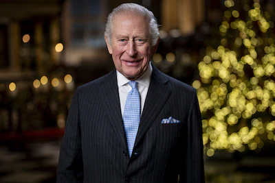 king-charles-reacts-during-the-recording-of-his-christmas-message-in-the-lady-chapel-of-westminster.webp