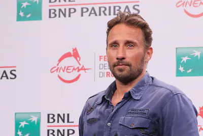 matthias-schoenaerts-attending-the-photocall-for-django-the-series-during-the-17th-rome-film-festiva.webp