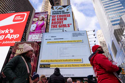 new-york-new-york-november-17-a-billboard-in-times-square-paid-for-by-the-group-home-of-the-brave-hi.webp