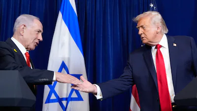 president-donald-trump-shakes-hands-with-israel-s-prime-minister-benjamin-netanyahu-during-a-news-co.webp