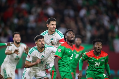 rabat-morocco-december-28-algeria-s-baghdad-bounedjah-algeria-s-aissa-mandi-burkina-faso-s-lassina-t.jpeg