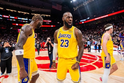 toronto-on-december-4-lebron-james-23-of-the-los-angeles-lakers-celebrates-after-defeating-the-toron.jpeg
