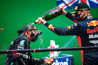 winner-mercedes-british-driver-lewis-hamilton-l-and-third-placed-red-bull-s-dutch-driver-max-verstap.jpeg