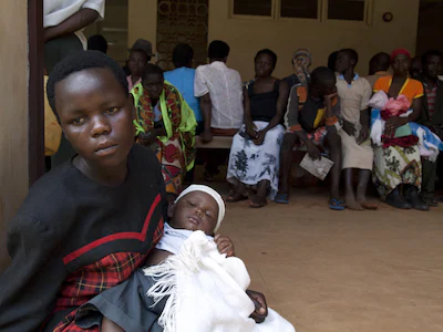 women-queue-with-their-babies-to-be-tested-for-hiv-at-a-hospital-in-bududa-eastern-uganda-on-septemb.webp