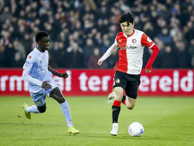 2026-01-18-16-52-56-rotterdam-l-r-ayoni-santos-of-sparta-rotterdam-en-in-beom-hwang-of-feyenoord-tij.webp
