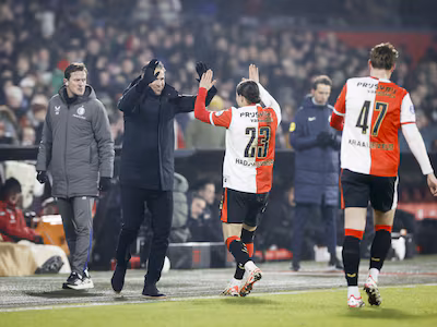 2026-01-25-18-30-08-rotterdam-anis-hadj-moussa-of-feyenoord-viert-de3-1-met-coach-robin-van-persie-t.avif