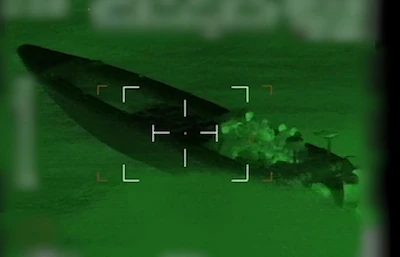a-screengrab-of-a-handout-video-taken-by-the-french-navy-with-a-night-vision-camera-in-the-night-of.webp