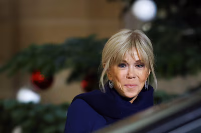 brigitte-macron-wife-of-french-president-emmanuel-macron-waits-to-receive-croatia-s-prime-minister-a.avif