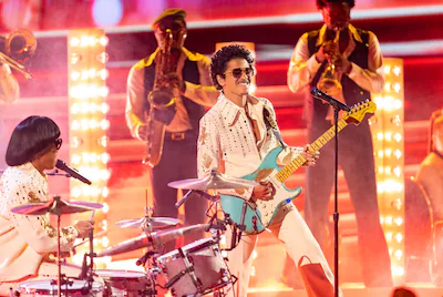 bruno-mars-of-silk-sonic-performs-onstage-at-the-64th-annual-grammy-awards-held-at-the-mgm-grand-gar.webp