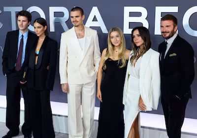 cruz-beckham-jackie-apostel-romeo-beckham-harper-beckham-victoria-beckham-and-david-beckham-attendin.avif