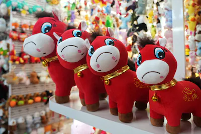 crying-horse-plush-toys-sit-on-display-ahead-of-the-chinese-lunar-new-year-which-will-welcome-the-ye.webp