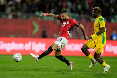egypt-s-mohamed-salah-scores-his-side-s-third-goal-during-the-africa-cup-of-nations-round-of-16-socc.webp