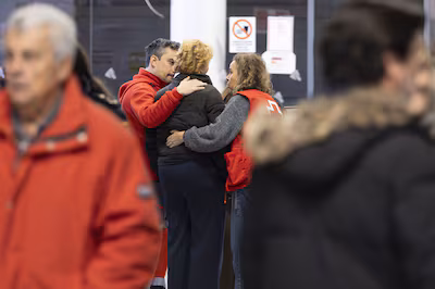 epa12659967-relatives-of-victims-arrive-seeking-information-about-the-derailment-at-huelva-train-sta.avif