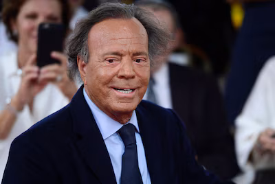 file-spanish-singer-julio-iglesias-smiles-during-his-star-unveiling-ceremony-at-the-walk-of-fame-in.avif