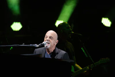 files-us-musician-billy-joel-performs-during-a-concert-at-the-formula-one-grand-prix-at-circuit-of-t.webp