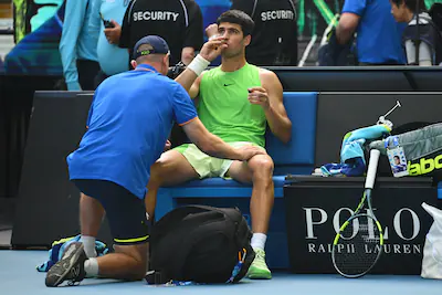 melbourne-australia-january-30-carlos-alcaraz-of-spain-receives-medical-treatment-in-the-men-s-singl.webp