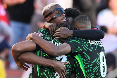 nigeria-s-forward-09-victor-osimhen-celebrates-his-goal-with-teammates-during-the-africa-cup-of-nati.webp