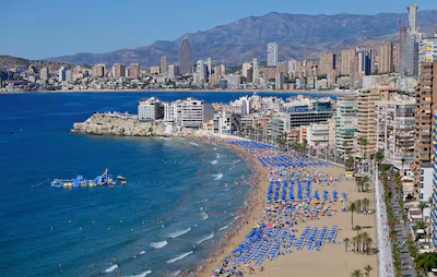 people-enjoy-the-levante-beach-in-benidorm-north-of-alicante-on-september-11-2025-photo-by-jose-jord.avif