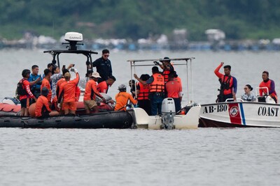 philippine-coast-guard-personnel-retrieve-a-sack-c-during-the-search-for-missing-cockfighters-allege.jpeg