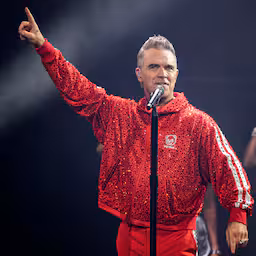 recensieoverzicht-nieuw-album-robbie-williams-onvervalste-feestvreugde.jpg