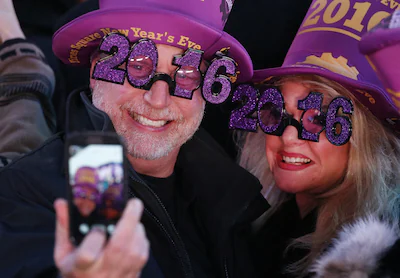 revelers-take-a-selfie-after-the-ball-drop-during-new-year-s-eve-celebrations-in-times-square-on-jan.webp