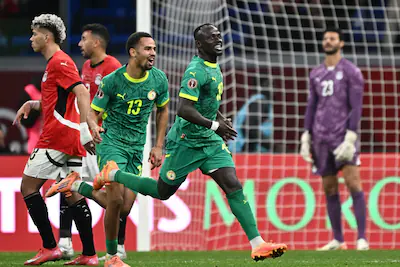 senegal-s-forward-10-sadio-mane-celebrates-his-goal-with-senegal-s-forward-13-iliman-ndiaye-during-t.webp