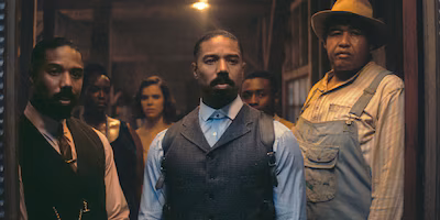 this-image-released-by-warner-bros-pictures-shows-michael-b-jordan-foreground-from-left-michael-b-jo.avif