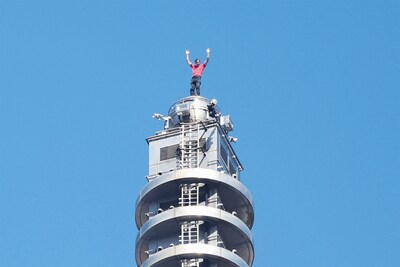 topshot-us-rock-climber-alex-honnold-raises-his-arms-from-the-top-of-the-taipei-101-building-after-h.jpeg