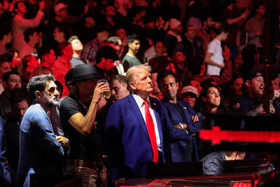 us-president-elect-donald-trump-singer-kid-rock-and-us-entrepreneur-vivek-ramaswa-stand-up-after-ufc.webp