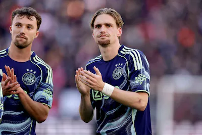 utrecht-netherlands-november-9-l-r-youri-regeer-of-ajax-kenneth-taylor-of-ajax-disappointed-after-th.webp