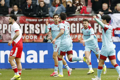 2026-02-08-12-24-56-utrecht-l-r-oussama-targhalline-of-feyenoord-jakub-moder-of-feyenoord-aymen-slit.webp