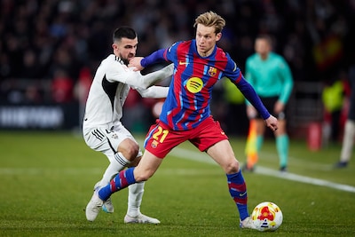 albacete-spain-february-03-frenkie-de-jong-of-fc-barcelona-competes-for-the-ball-with-agus-medina-of.jpeg