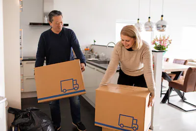 beautiful-middle-aged-couple-moving-house-together.webp